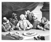 old photo of gathering at table